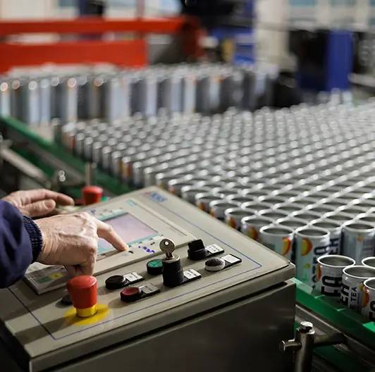 Close-up of control panel buttons at bottling machine